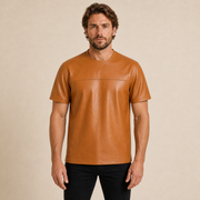 Front view of a man wearing a MOTOGRIP GEAR orange lambskin leather crew-neck T-shirt.