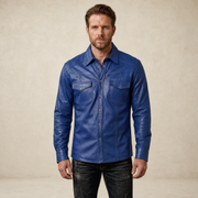 Male model wearing the MOTOGRIP men's blue lambskin leather biker shirt, front view