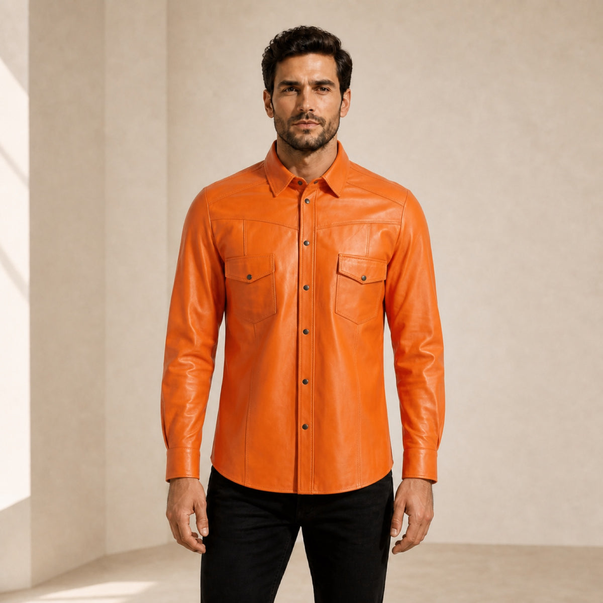 Men's orange lambskin leather shirt shown from the front on a model.