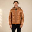 MOTOGRIP GEAR men's tan sheepskin leather hooded puffer jacket, front model view.