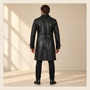 MOTOGRIP Bramwell men's 1970s Black Leather Trench Coat, back view on a model.