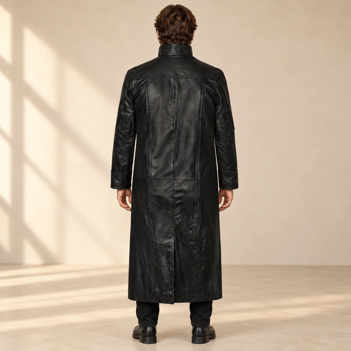 Man wearing the Nightwarden black Napa leather trench coat from the back