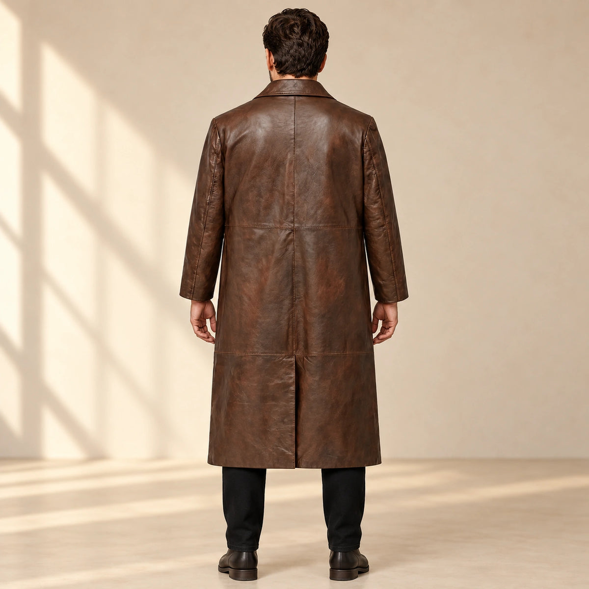 Man wearing the Prestwick dark brown leather long coat from the back