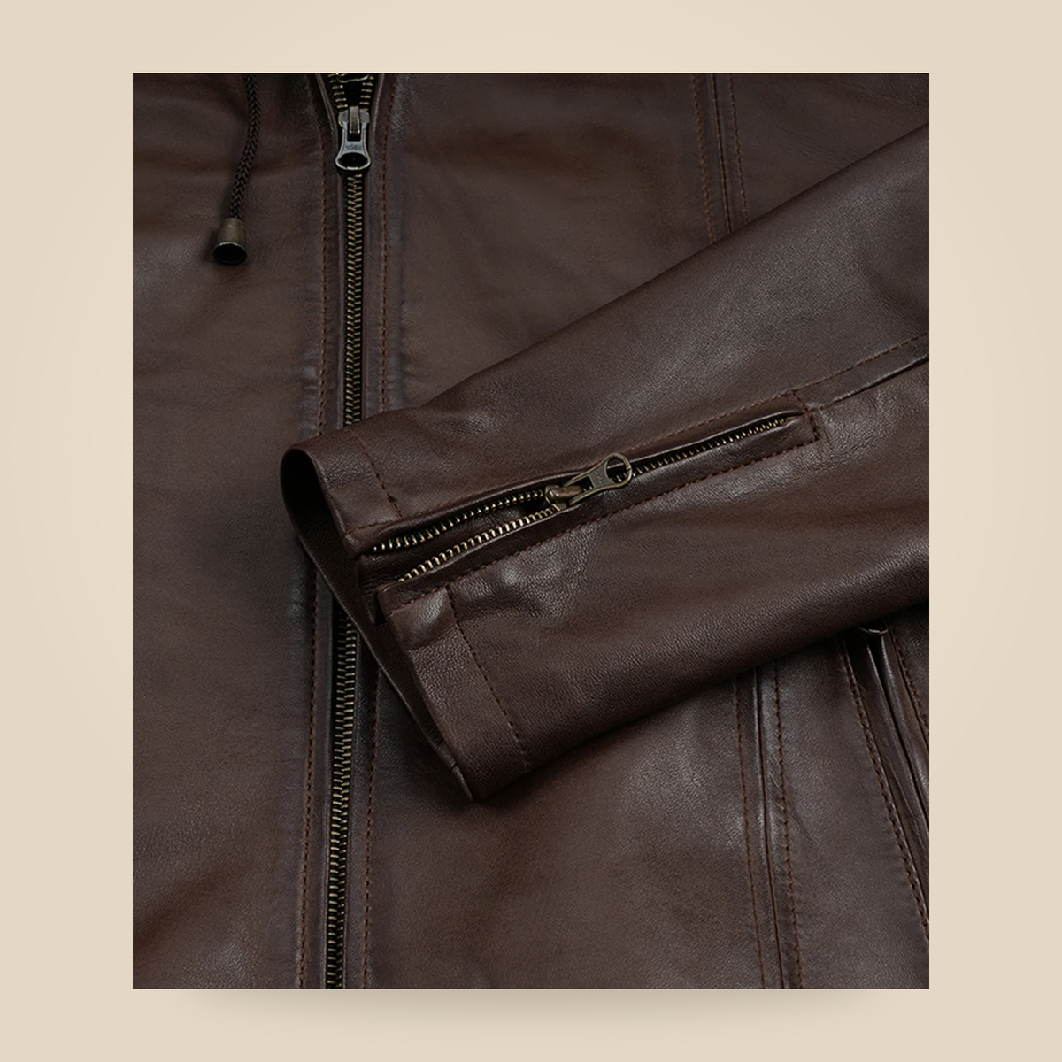 Men's Dark Brown Hand-Waxed Lambskin Hooded Leather Jacket - zipper cuff close up view by MOTOGRIP GEAR