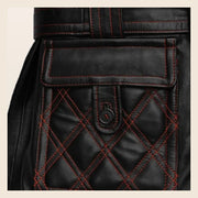 MOTOGRIP Redmere men's Black Quilted Sheepskin Leather Trench Coat, close-up of the quilted pocket and red stitching.
