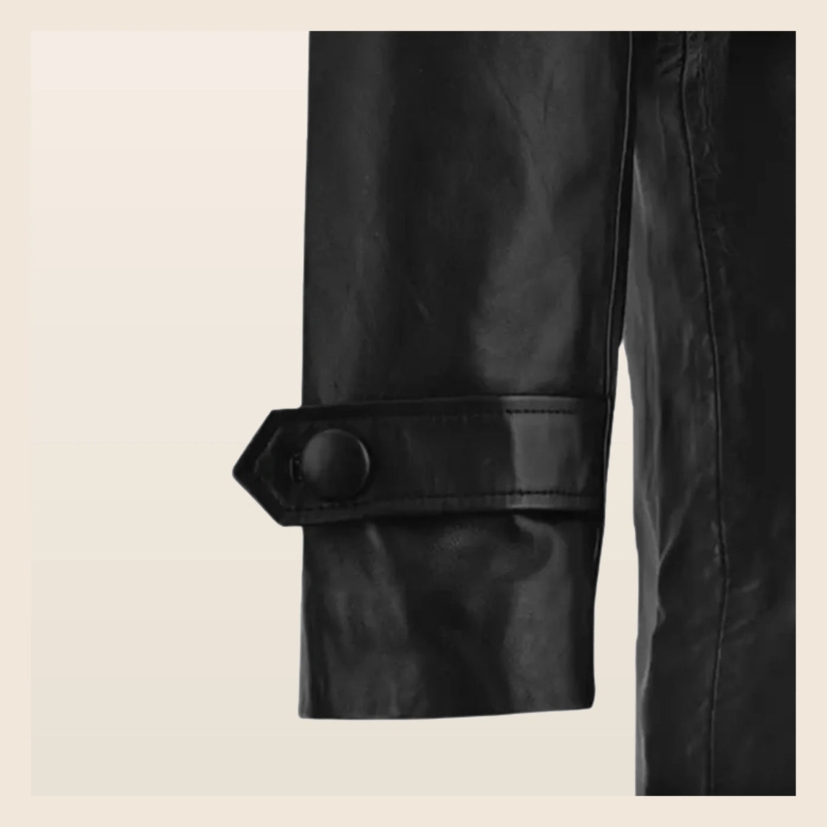 MOTOGRIP Bramwell men's 1970s Black Leather Trench Coat, close-up of the cuff strap.