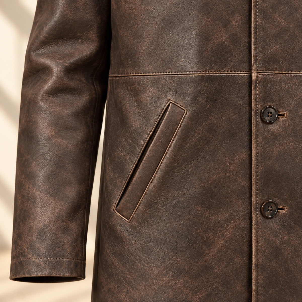 Close view of the Winfield coat slanted welt pocket and stitching