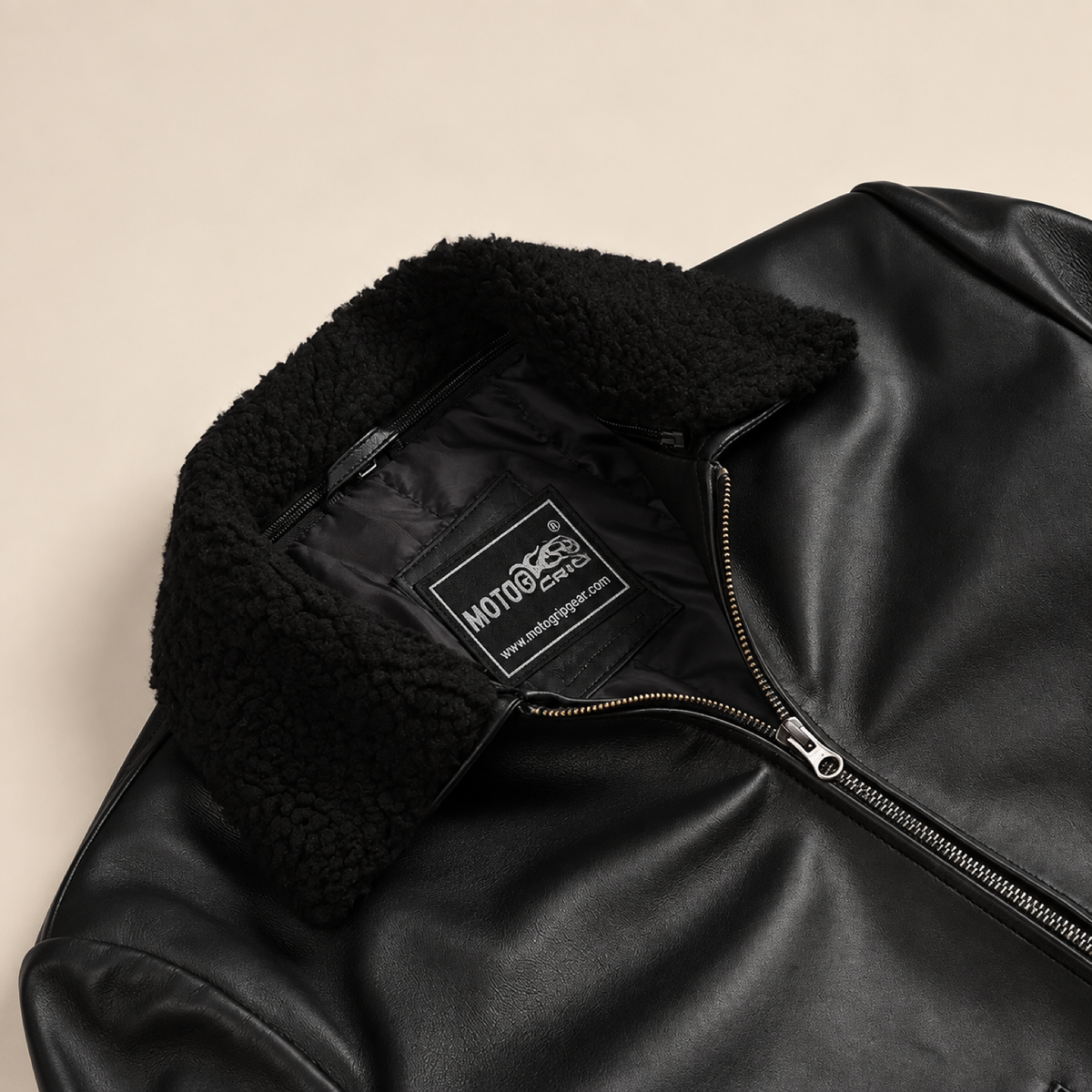Ashford men’s black lambskin leather bomber jacket: Close-up of the collar, neck lining and zipper.