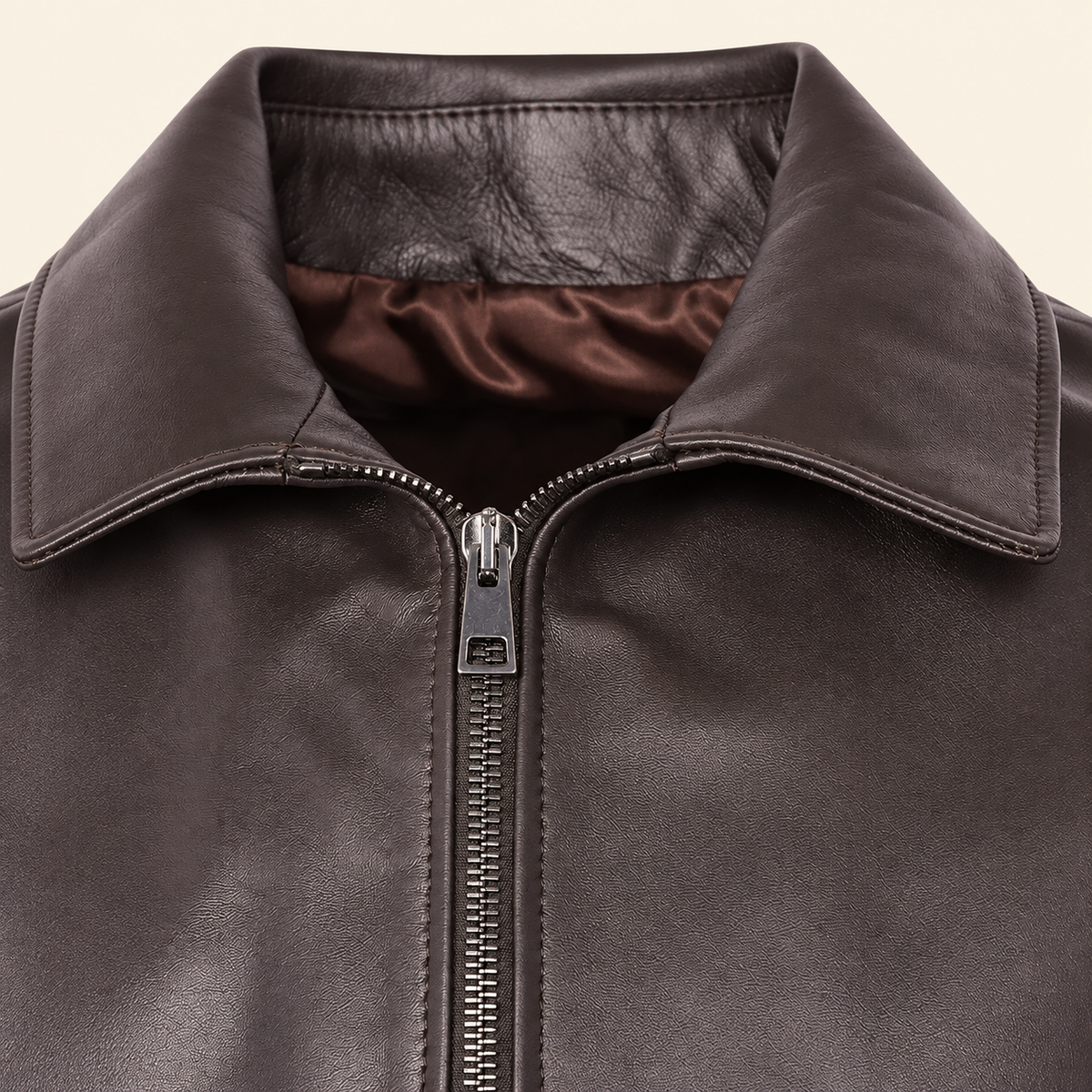 Chocolate Brown men's point-collar lambskin leather jacket, close up.