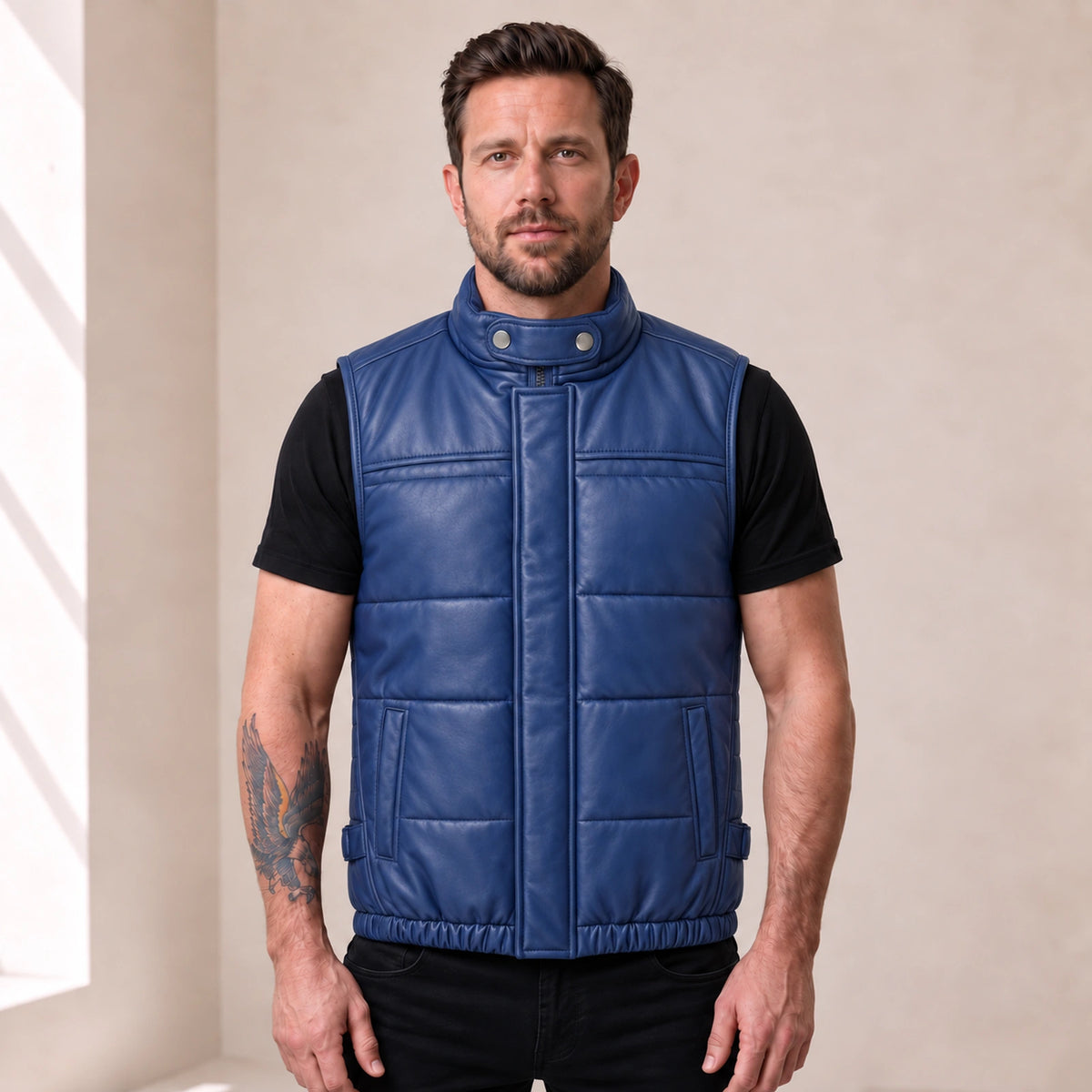 Braywick men's blue genuine leather bubble puffer vest, modeled front view