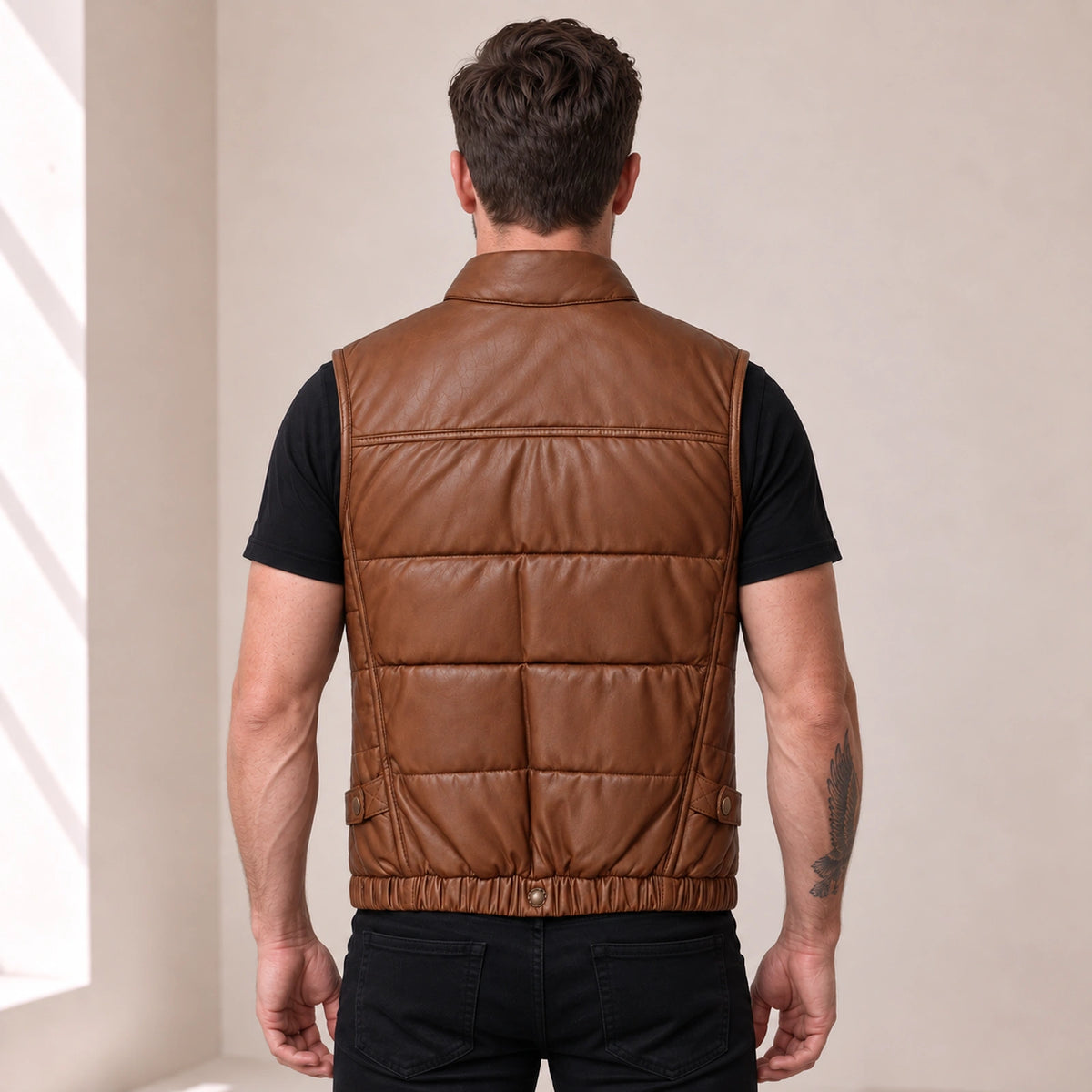 Braywick men's cognac genuine leather bubble puffer vest, modeled back view