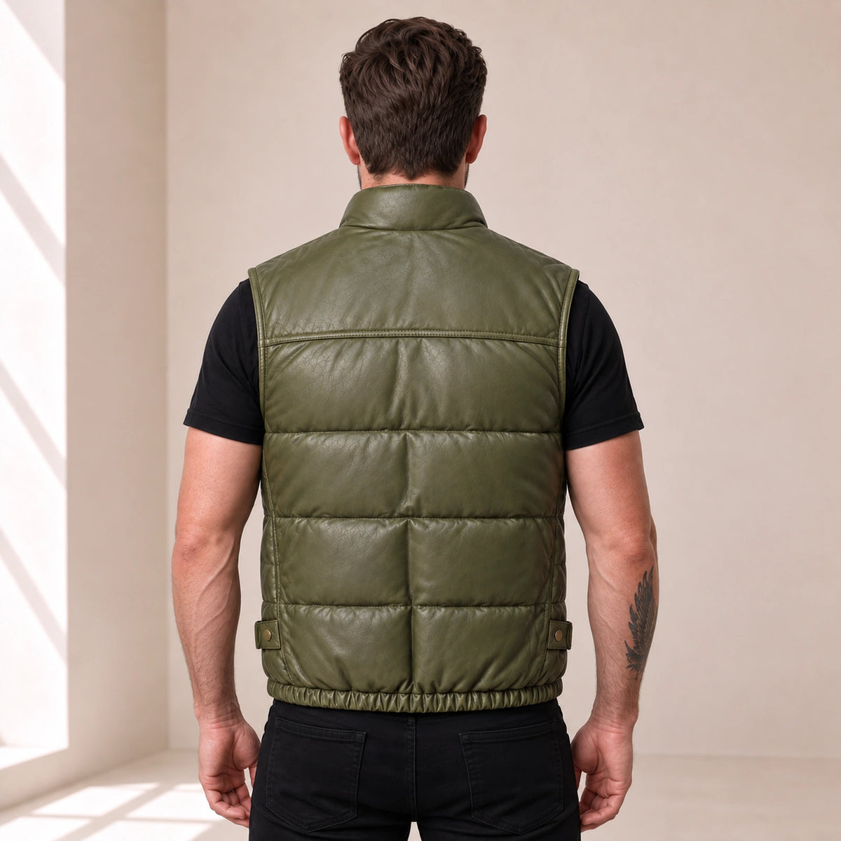 Braywick men's olive green genuine leather bubble puffer vest, modeled back view