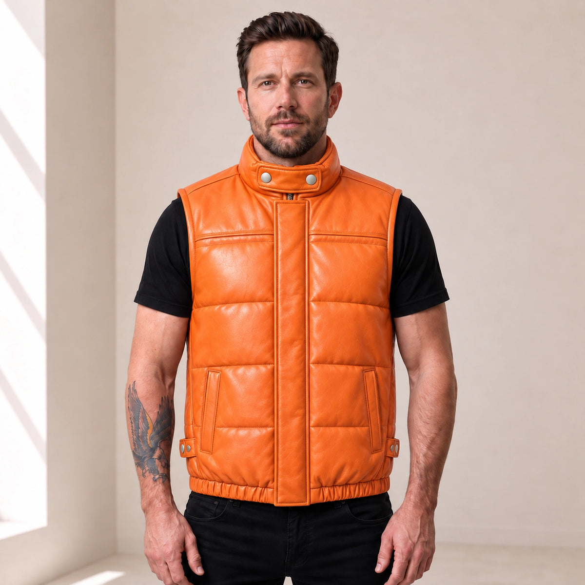 Braywick men's orange genuine leather bubble puffer vest, modeled front view