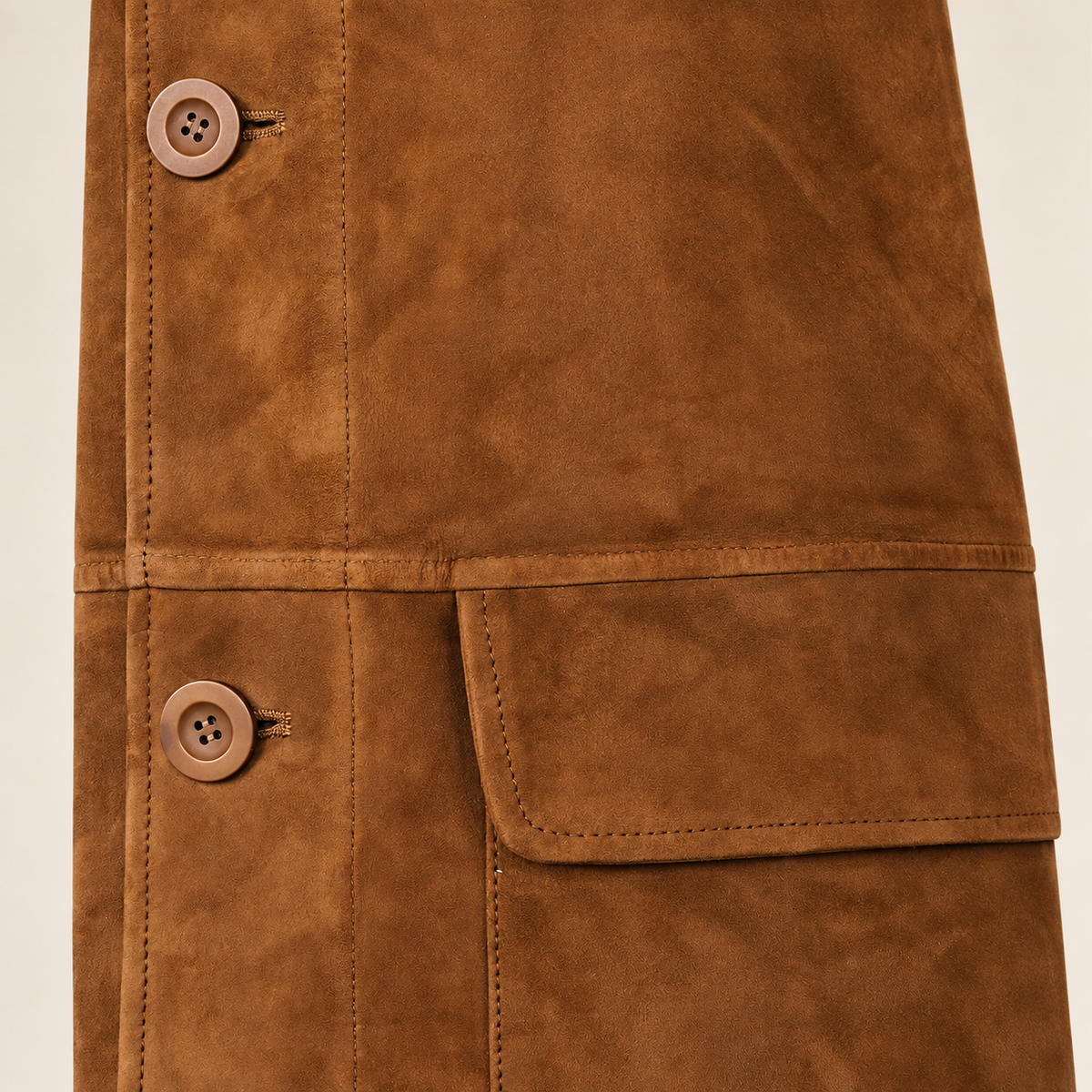 Close-up of the leather texture and construction of the Cairnwell men's brown blue reversible leather blazer coat.