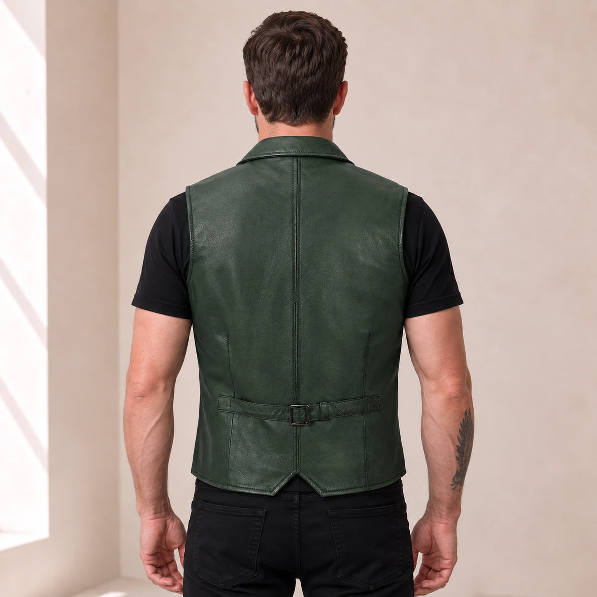 Green Ellswick men's lambskin leather waistcoat shown from the back with adjustable waist strap.