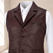 Close-up of the maroon Ellswick waistcoat's lambskin leather, notch lapel, stitching and buttons.