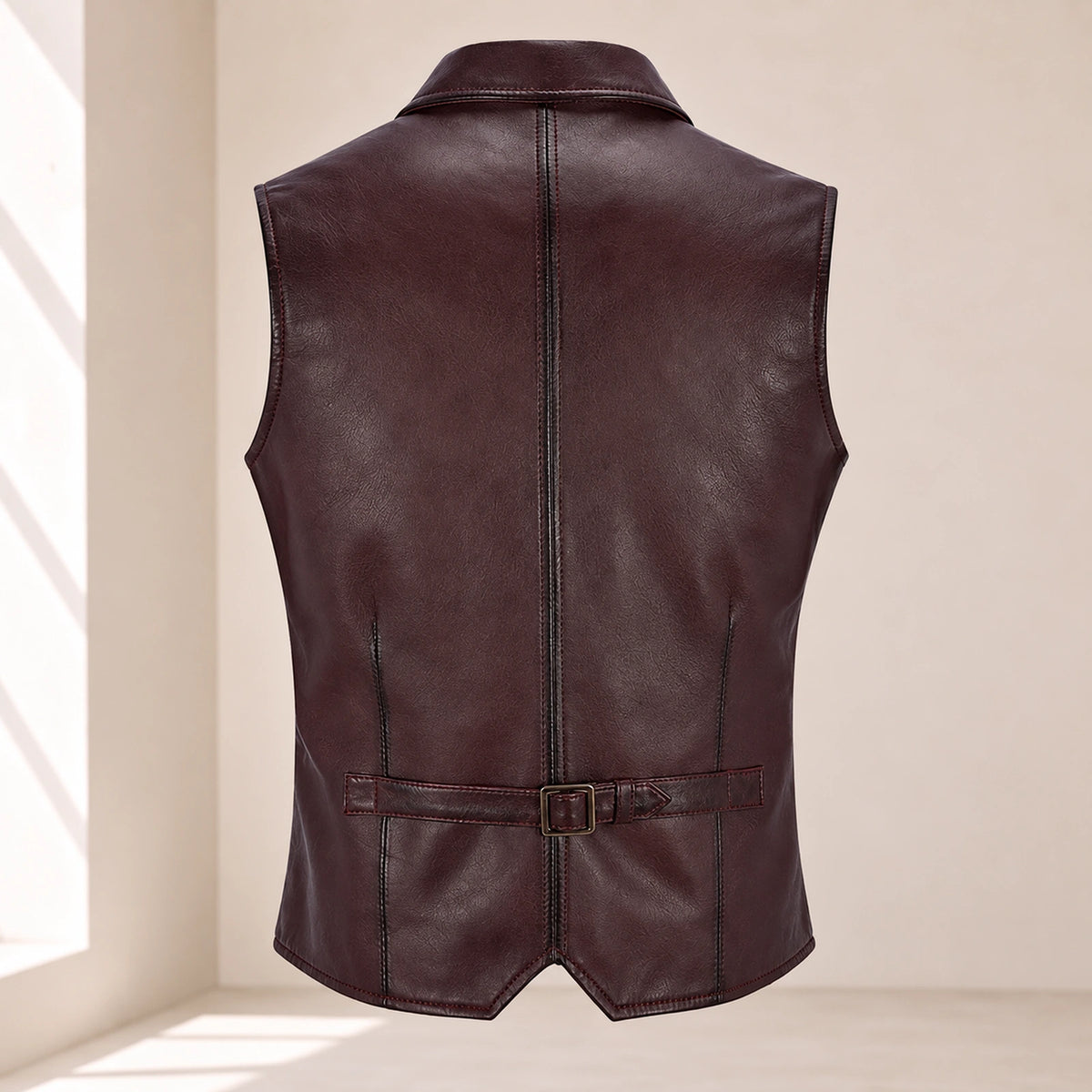 Back product view of the maroon Ellswick lambskin leather waistcoat with centre seam and waist adjuster.
