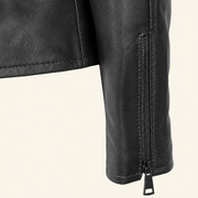 Black women's fitted lambskin racer jacket, close up.