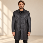 Front view worn by a male model of the Eversham men's dark brown mid-length leather coat.