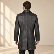 Rear view worn by a male model of the Falkner men's black retro leather coat.