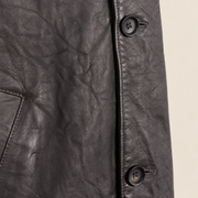 Close-up of the leather texture and construction of the Falkner men's grey retro leather coat.