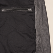 Interior construction and pocket detail of the Falkner men's grey retro leather coat.