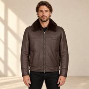Front view worn by a male model of the Glenwick men's brown shearling bomber jacket.
