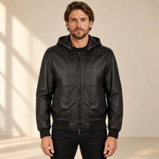 Halston Men's Hooded Lambskin Leather Bomber Jacket in black front view on male model
