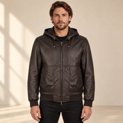 Halston Men's Hooded Lambskin Leather Bomber Jacket in dark brown front view on male model