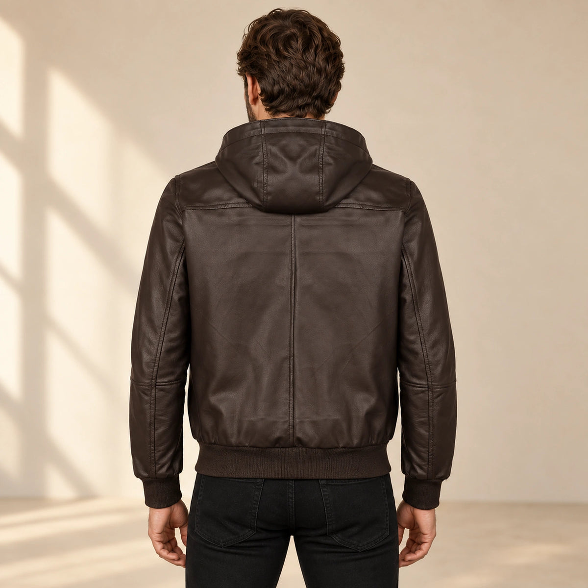 Halston Men's Hooded Lambskin Leather Bomber Jacket in dark brown back view on male model