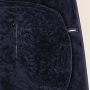 Interior construction and pocket detail of the Hawkridge men's navy shearling car coat.