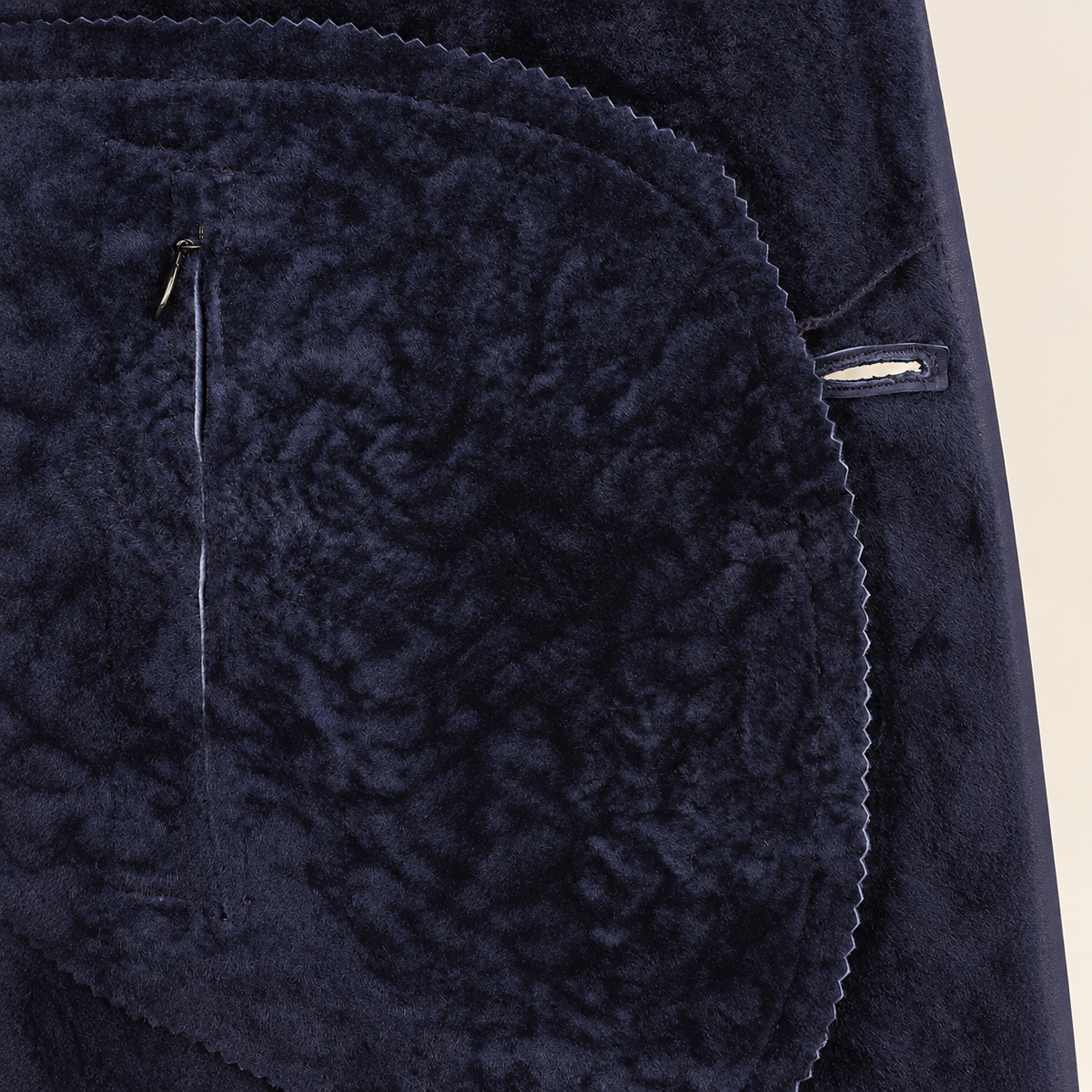 Interior construction and pocket detail of the Hawkridge men's navy shearling car coat.