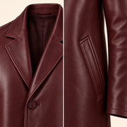 Idris men's burgundy long leather coat, notch lapel and welt pocket close-up