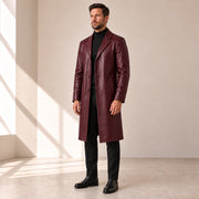 Idris men's burgundy long leather coat, right three-quarter view on model