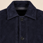 Close-up of the leather texture and construction of the Kelston men's blue reversible suede coat.