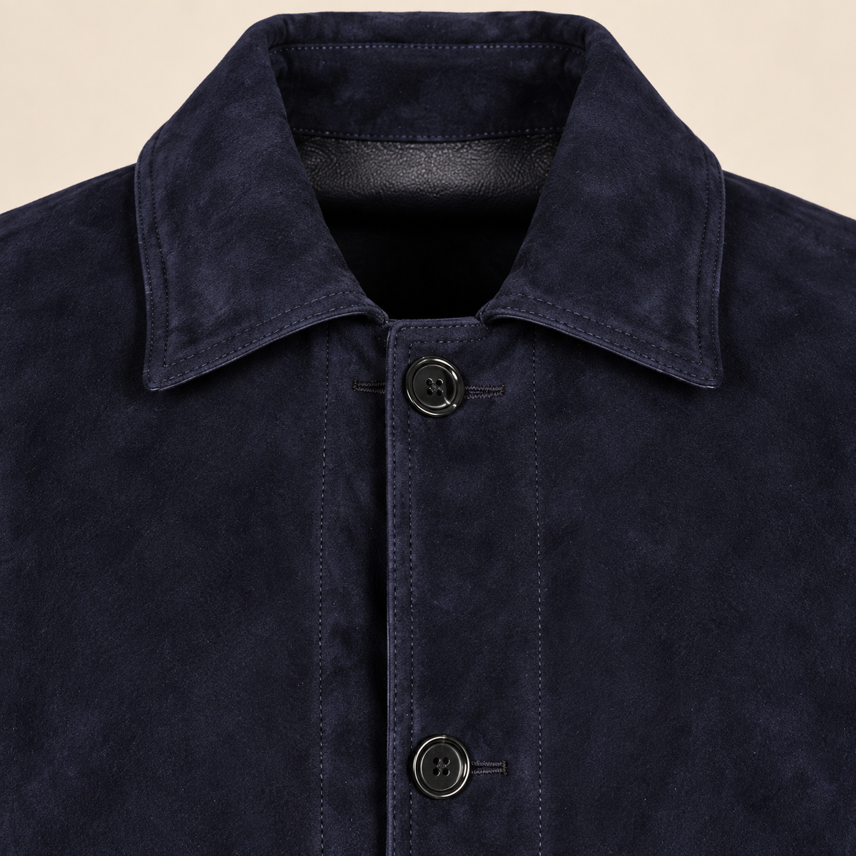 Close-up of the leather texture and construction of the Kelston men's blue reversible suede coat.