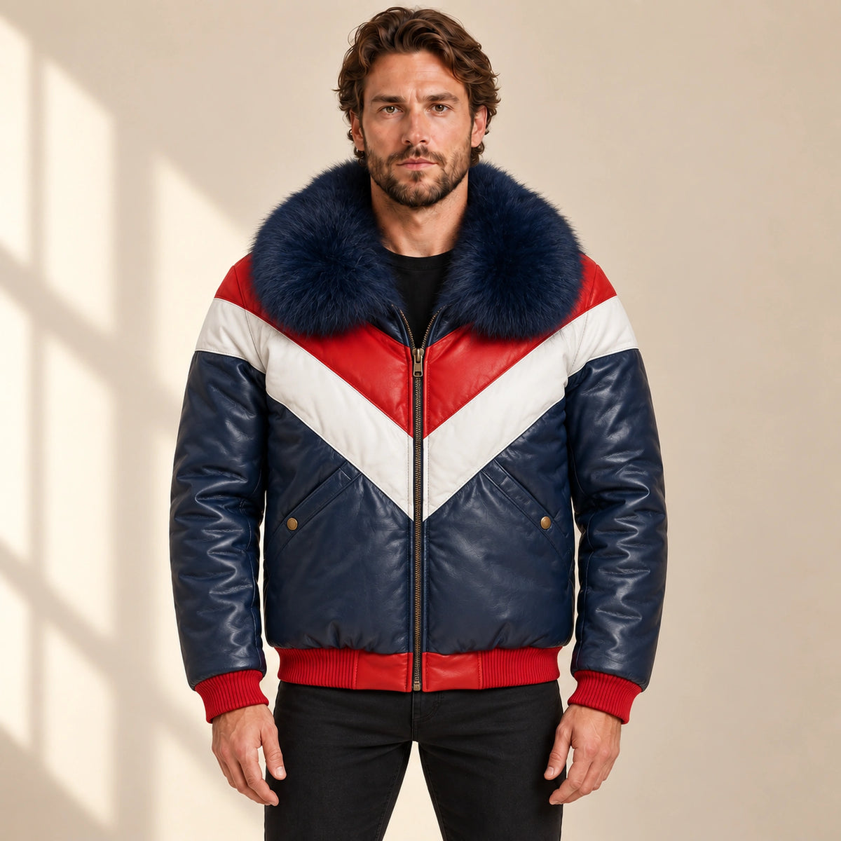Front model view of the MOTOGRIP red, white and navy lambskin leather puffer jacket, showing its navy body with red and white V panels.