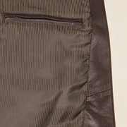 Interior construction and pocket detail of the Loxley men's brown leather trench coat.