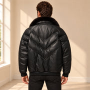 Back model view of the MOTOGRIP black lambskin leather puffer jacket, showing its black body with tonal V stitching.