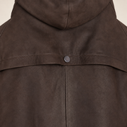 Close-up of the hood construction of the Norcliffe men's brown hooded leather parka.