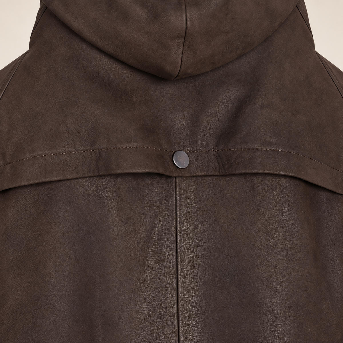 Close-up of the hood construction of the Norcliffe men's brown hooded leather parka.