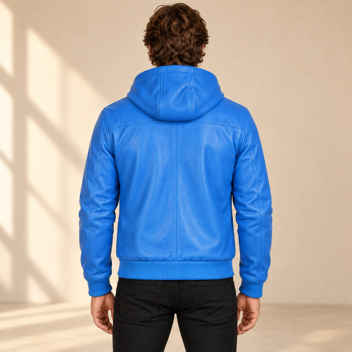 Male model wearing the Northwick Blue genuine leather zip hoodie, back view.
