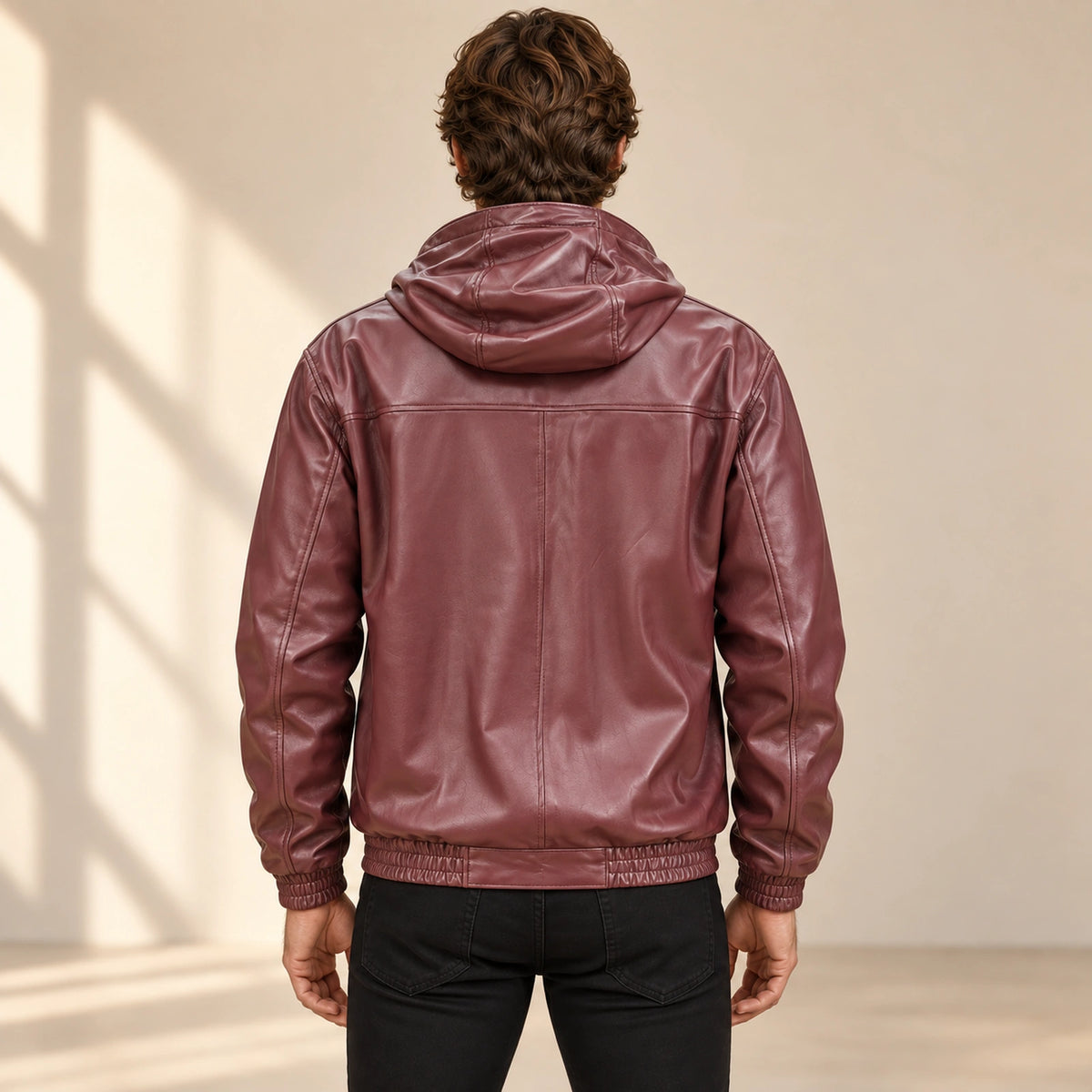 Male model wearing the Northwick Burgundy genuine leather zip hoodie, back view.