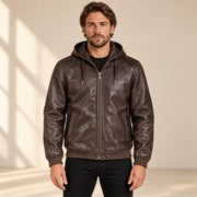 Male model wearing the Northwick Cafe Brown genuine leather zip hoodie, front view.