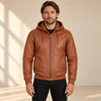 Male model wearing the Northwick Cognac genuine leather zip hoodie, front view.