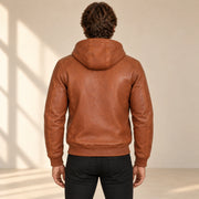 Male model wearing the Northwick Cognac genuine leather zip hoodie, back view.