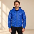 Male model wearing the Northwick Dark Blue genuine leather zip hoodie, front view.