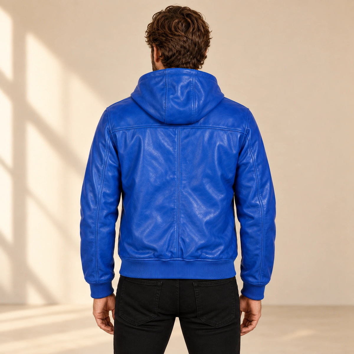 Male model wearing the Northwick Dark Blue genuine leather zip hoodie, back view.