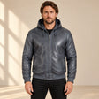 Male model wearing the Northwick Grey genuine leather zip hoodie, front view.