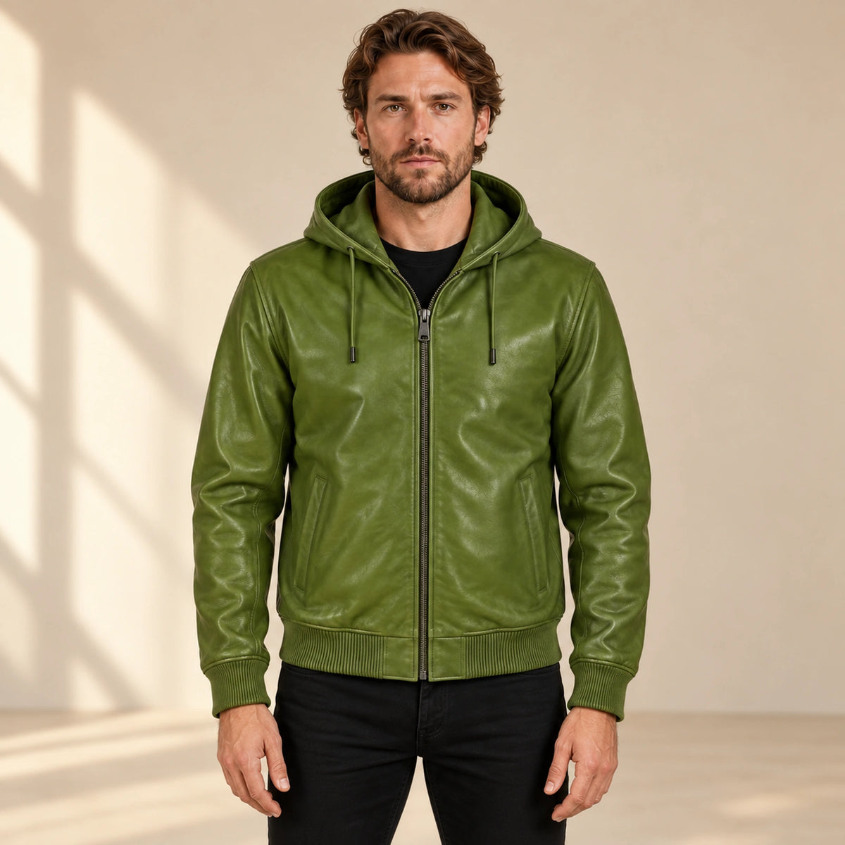 Male model wearing the Northwick Hunter Green genuine leather zip hoodie, front view.
